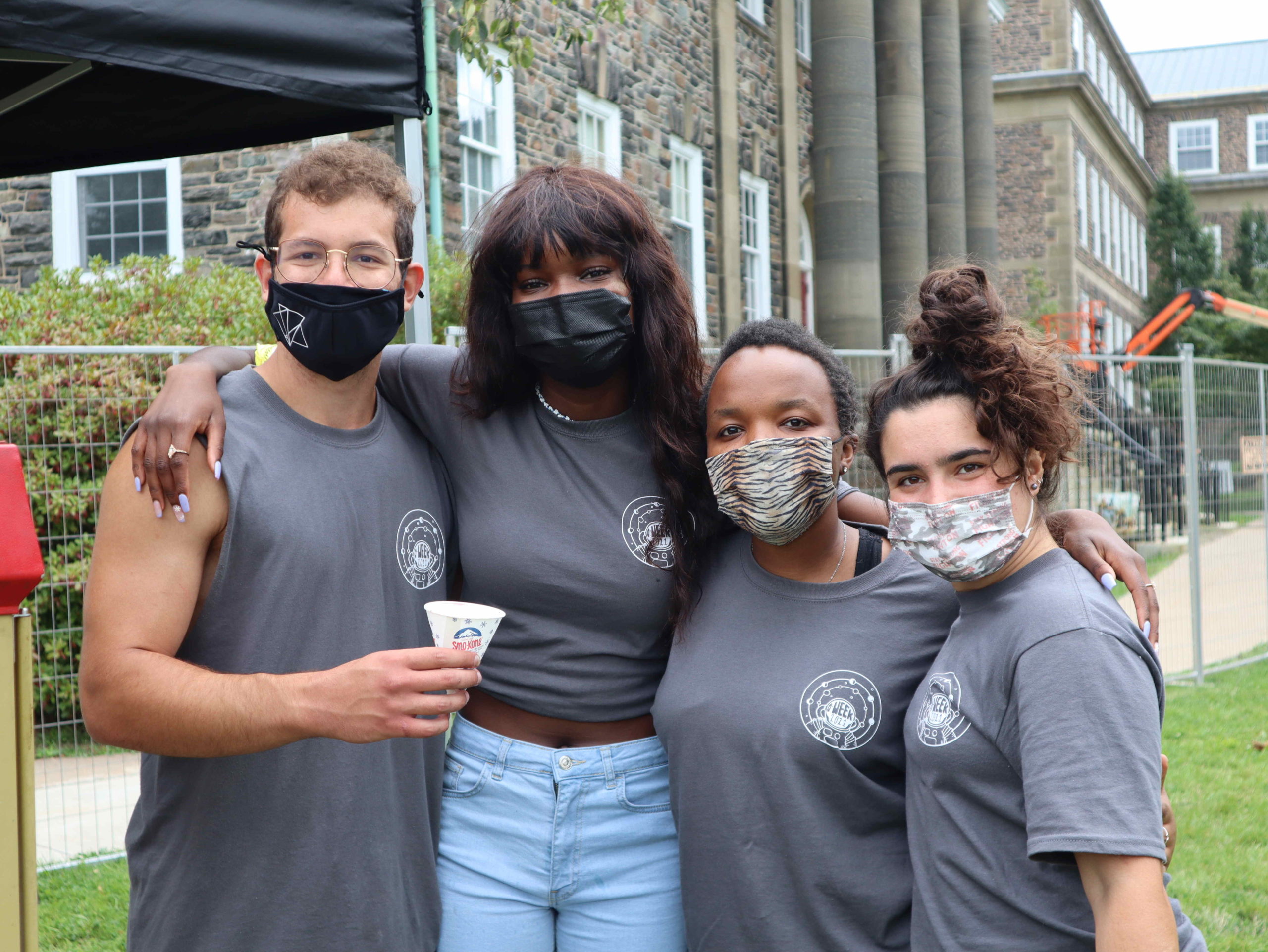 4 Dalhousie students posing for a picture with masks on